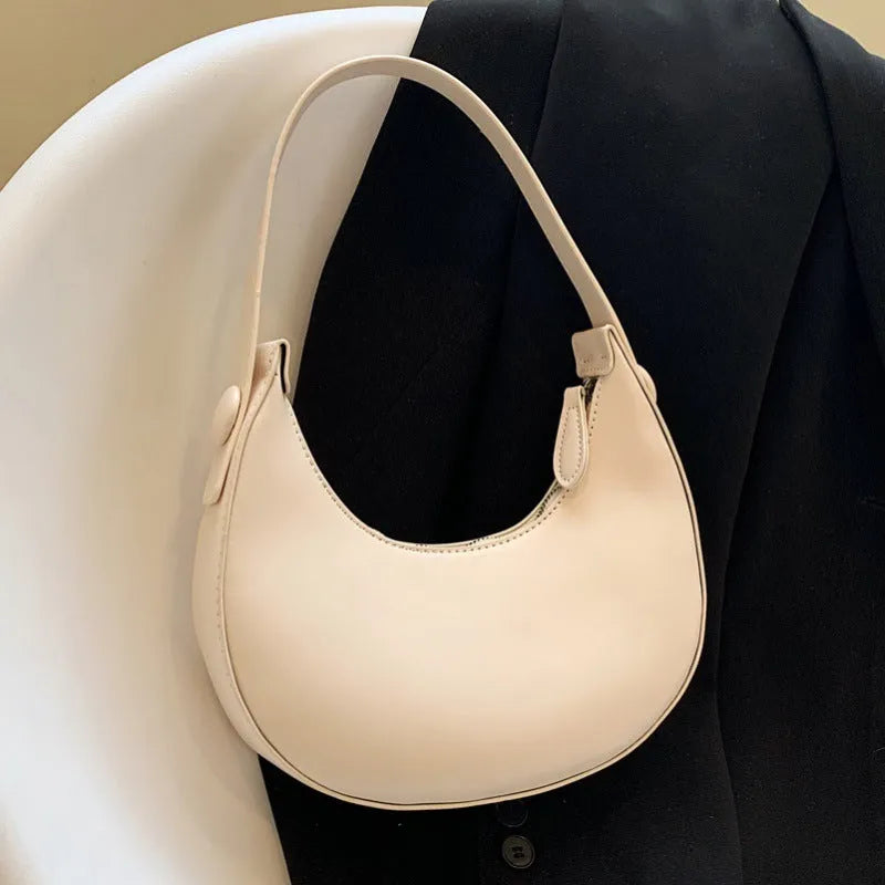 Retro dumpling-shaped women's shoulder bag in PU leather with sandwich pocket design