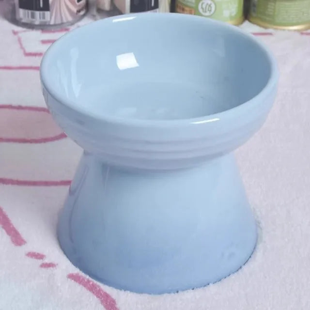 Black ceramic pet bowl with high neck protector and anti-tumble base design