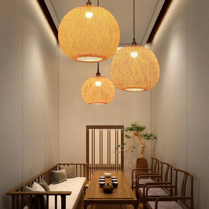 Zen-style pastoral ceiling chandelier with a woven natural rattan lampshade.