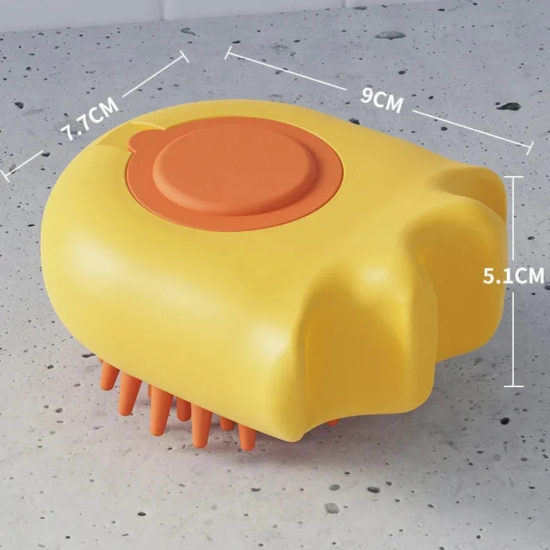 Pet bath massage brush with shampoo reservoir box in blue orange yellow colours measuring 9x8x5.3cm
