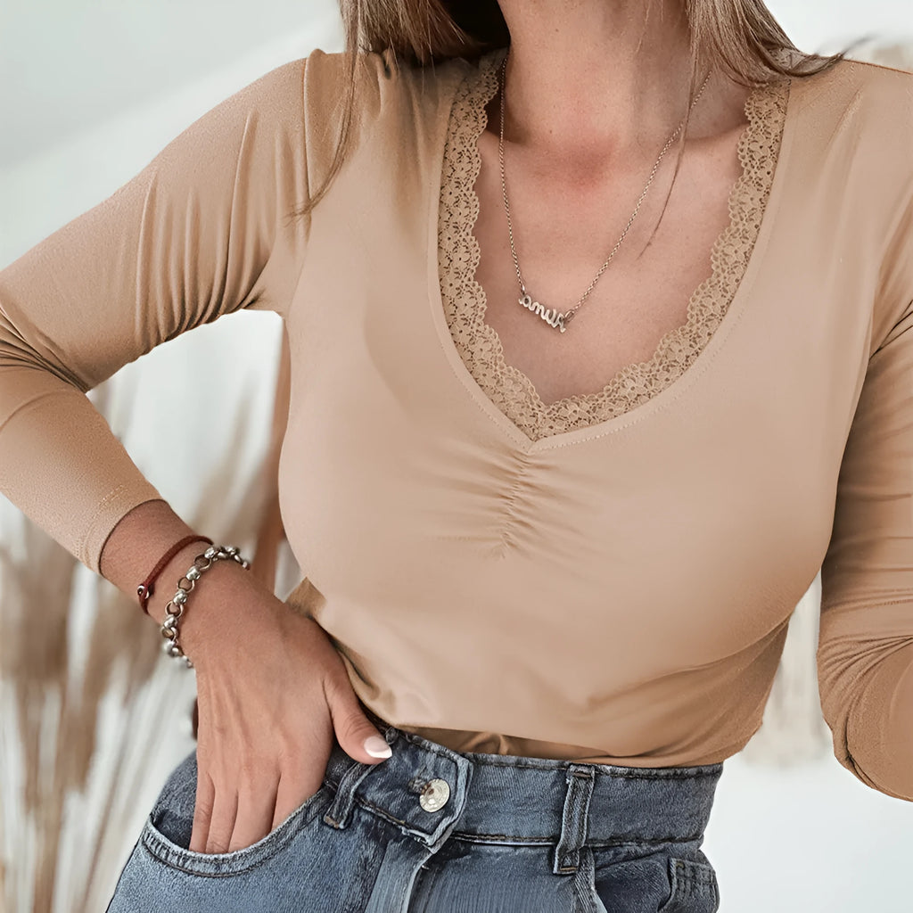 Long sleeve casual top with lace trim detail in solid colour option showing slim fit styling