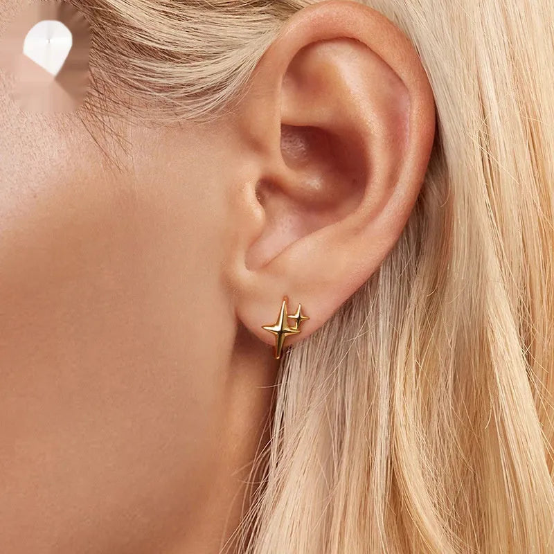 Minimalist star design sterling silver ear clip jewellery with oxidation treatment