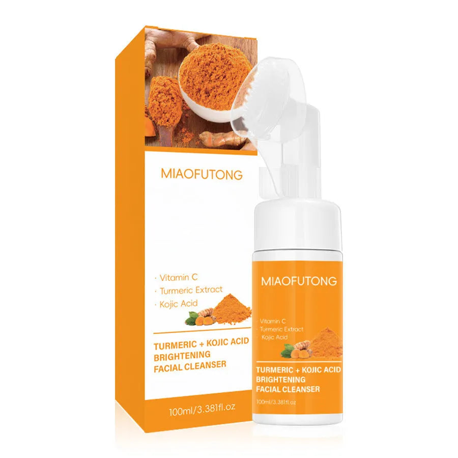Turmeric facial cleansing set showing mousse tube, disposable pads, ginger soap bar with net, and additional components