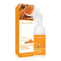 Turmeric facial cleansing set showing mousse tube, disposable pads, ginger soap bar with net, and additional components