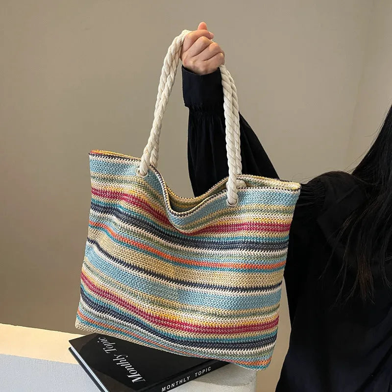 Blue straw woven nylon shoulder bag with polyester lining and single shoulder strap