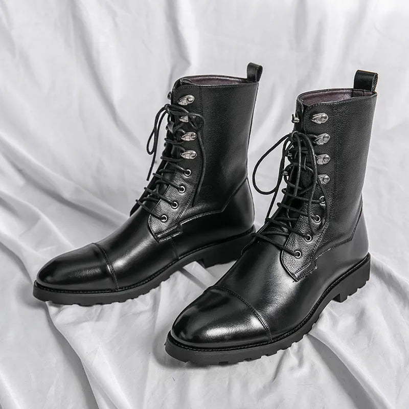 Black denim lace-up booties with lace closure and low heel on a white background