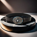 Men's brown imitation leather belt with detailed cow head alloy buckle showing electroplating and carving treatments