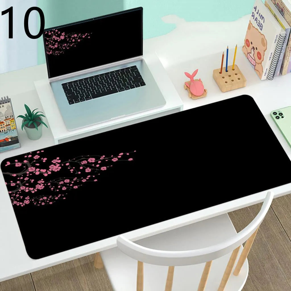 Large rubber gaming mouse desk mat with printed design, available in multiple sizes and thicknesses