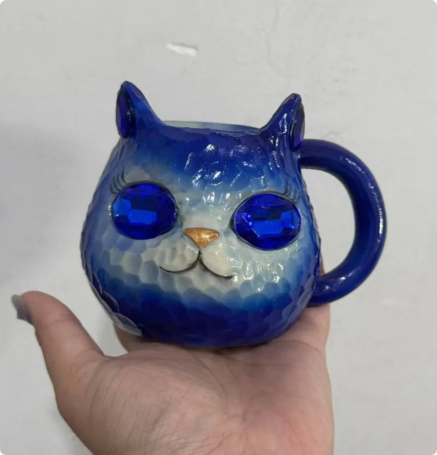 American style resin cat cup decorative figurine in purple, green, blue, or pink.