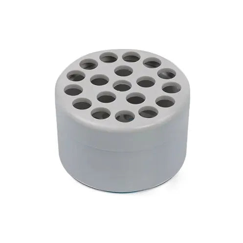 Three spiral stem brackets in green, light gray, and yellow placed on a table