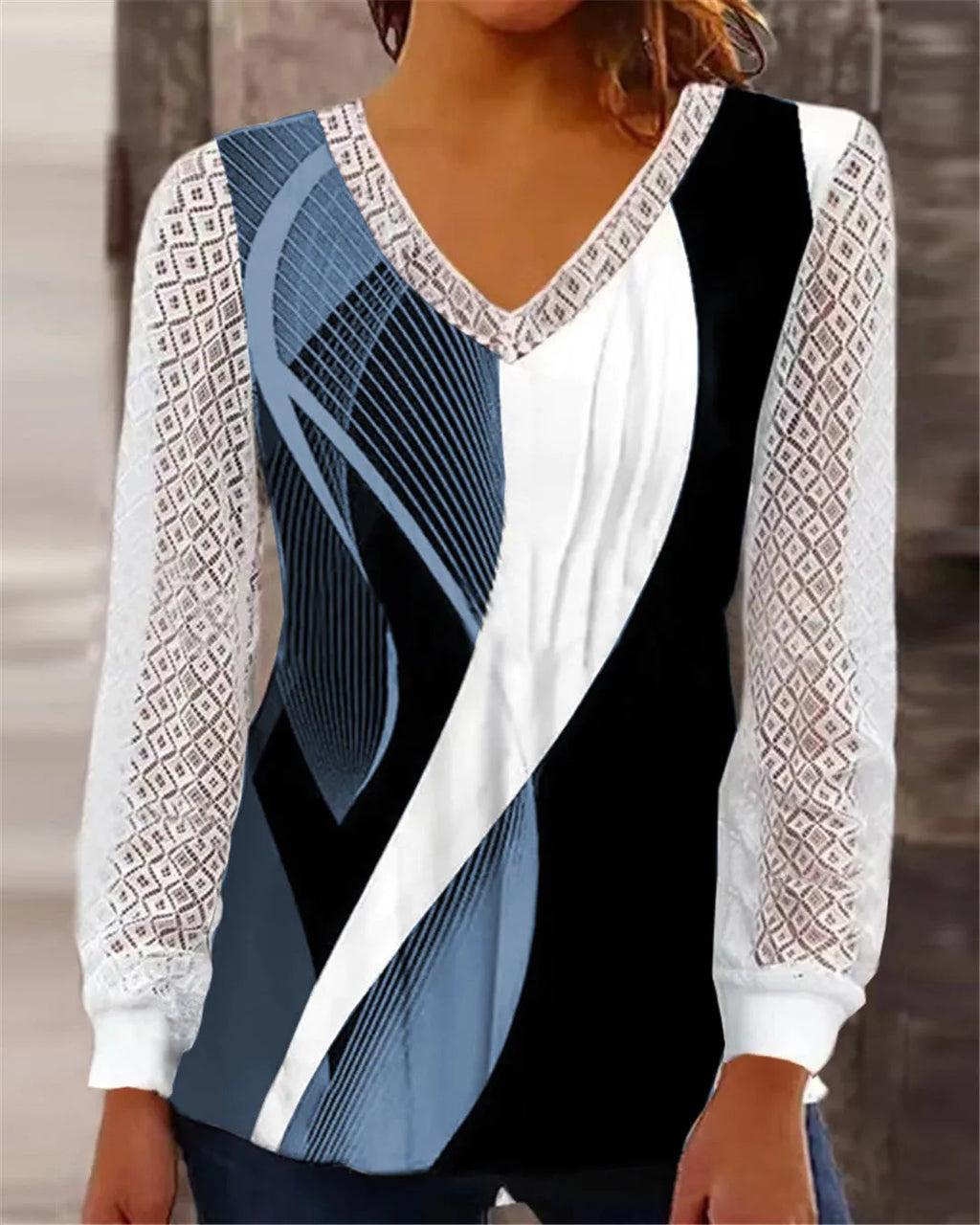 Loose fit V-neck lace top with hollow-out details in polyester fabric