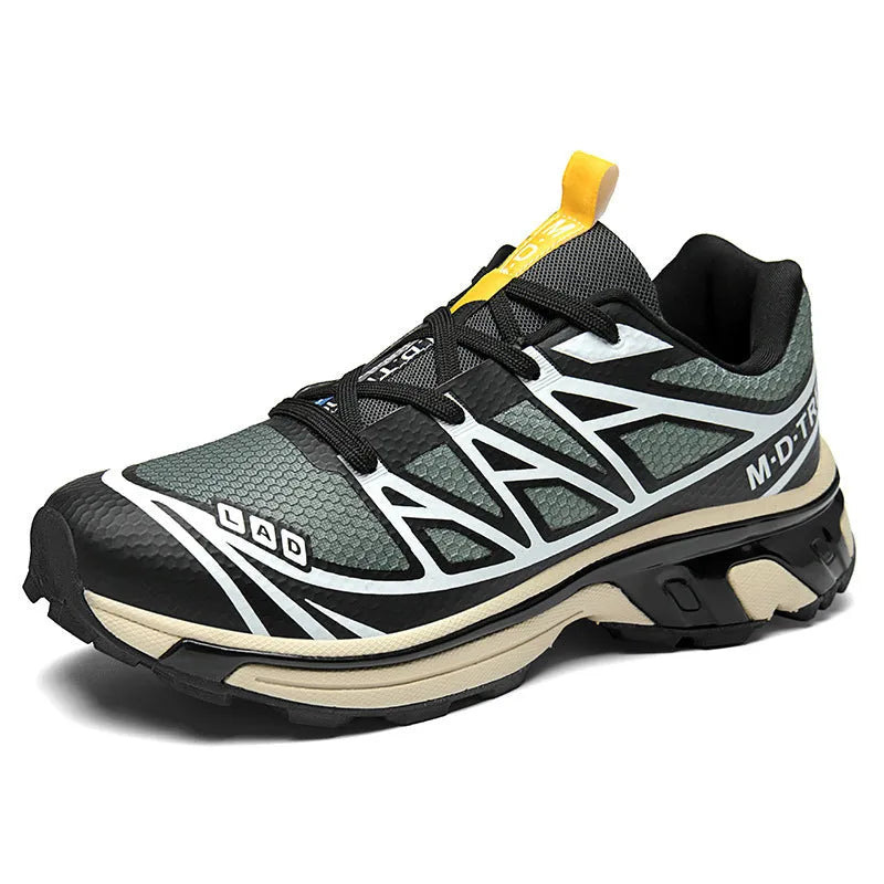 Low top hiking shoes in khaki with round toe, artificial leather upper, and flat rubber sole.