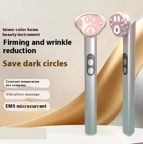 Pink cat's paw shaped eye massager with micro-current vibration and colour light function