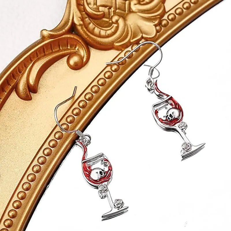 Geometric skull wine glass drop earrings in metallic finish