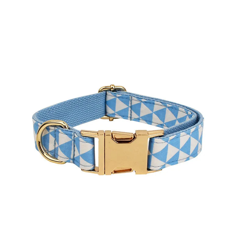 Blue cloth dog collar, leash, bow, and vest four-piece pet accessory set shown with size options