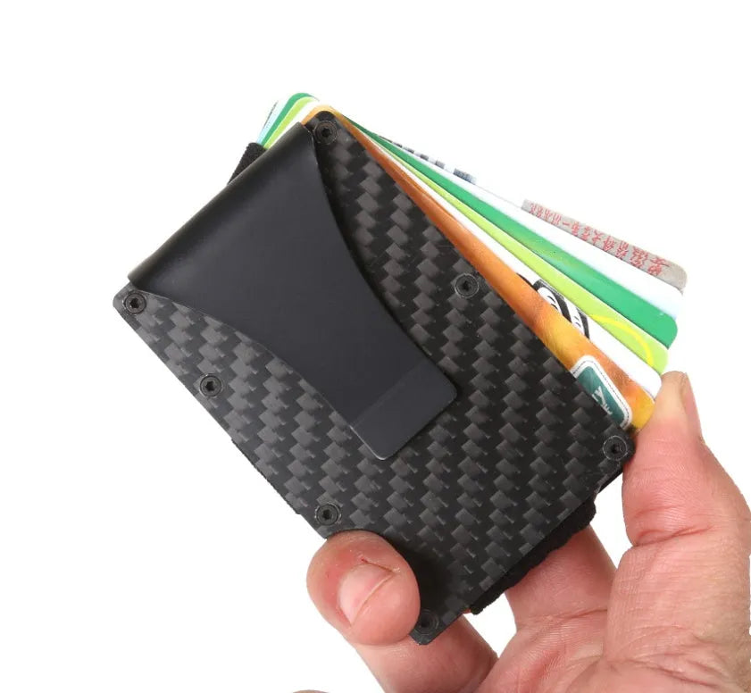 Black carbon fiber and aluminum RFID anti-magnetic card holder wallet on flat surface