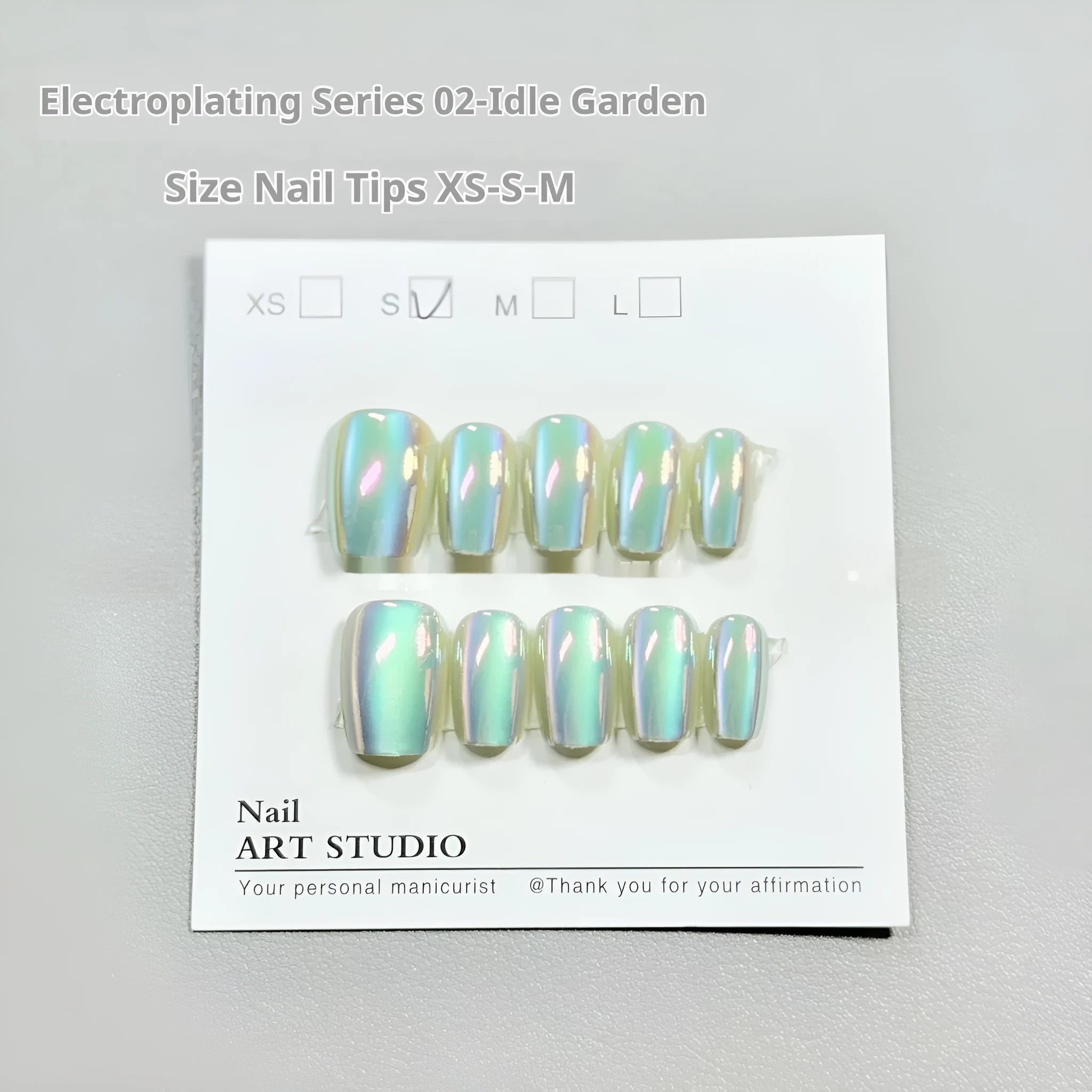 Electroplated Cat's Eye artificial nails with Aurora armour effects in short ladder sizes XS, S, M