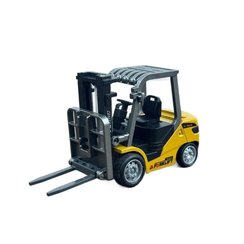 Remote control miniature alloy forklift on desk with remote control unit