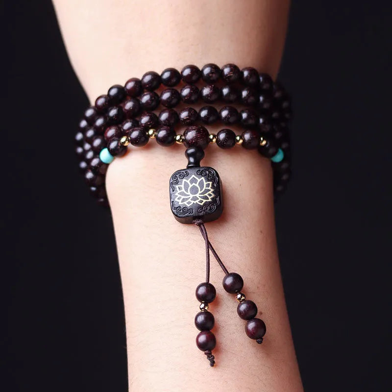 Zambia rosewood Buddha beads bracelet with flat lotus pendant showing 108 wooden beads