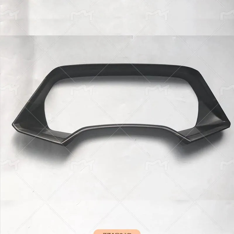 BMW X5 dashboard decorative frame in ABS plastic with carbon fibre or peach wood finish