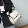 Genuine leather women's messenger bag in horizontal square shape with internal organisation pockets