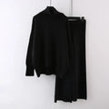 Women's milky white acrylic knit sweater and wide-leg trousers two-piece casual set.
