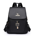 Casual women's leather backpack in black with textured pu finish and three-dimensional pocket design