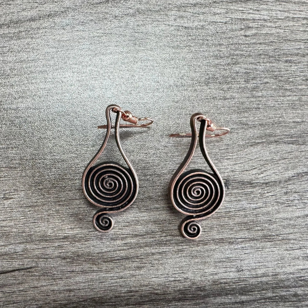 Bronze spiral psychedelic drop earrings with geometric shape and alloy construction