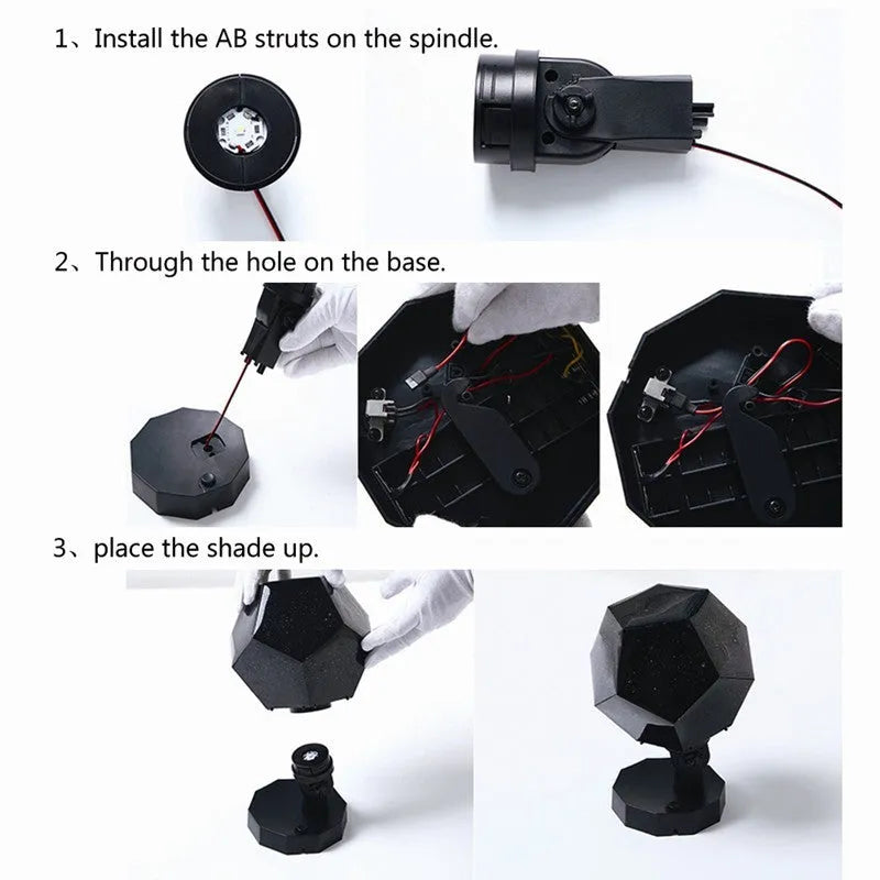 A white plastic LED star projector night light with remote control on a table.