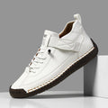 Men's mid-top Martin boots in multiple colours with elastic band and tooling stitching detail.