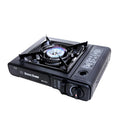 Outdoor windproof portable cassette stove in black plastic case with piezoelectric ignition and safety device