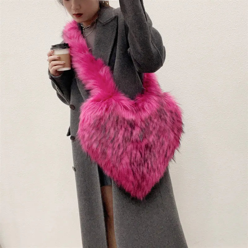 Women's heart-shaped plush crossbody bag in black with tassel and large capacity