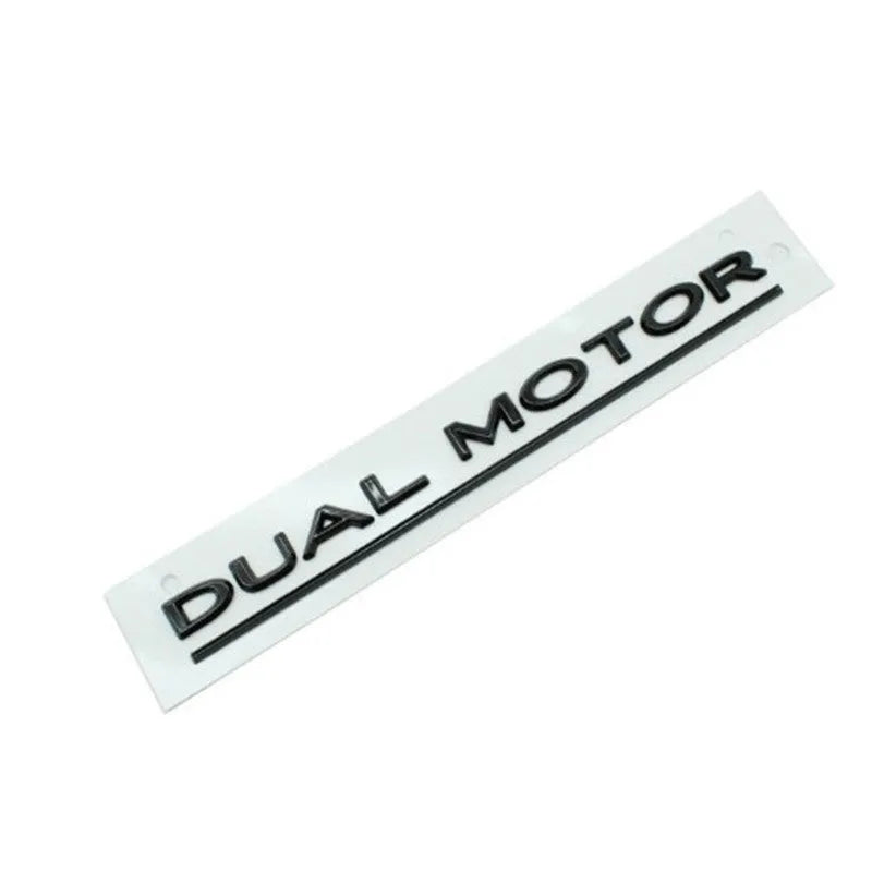 Tesla Model 3 double motor bumper sticker in ABS plastic measuring 19cm by 3cm