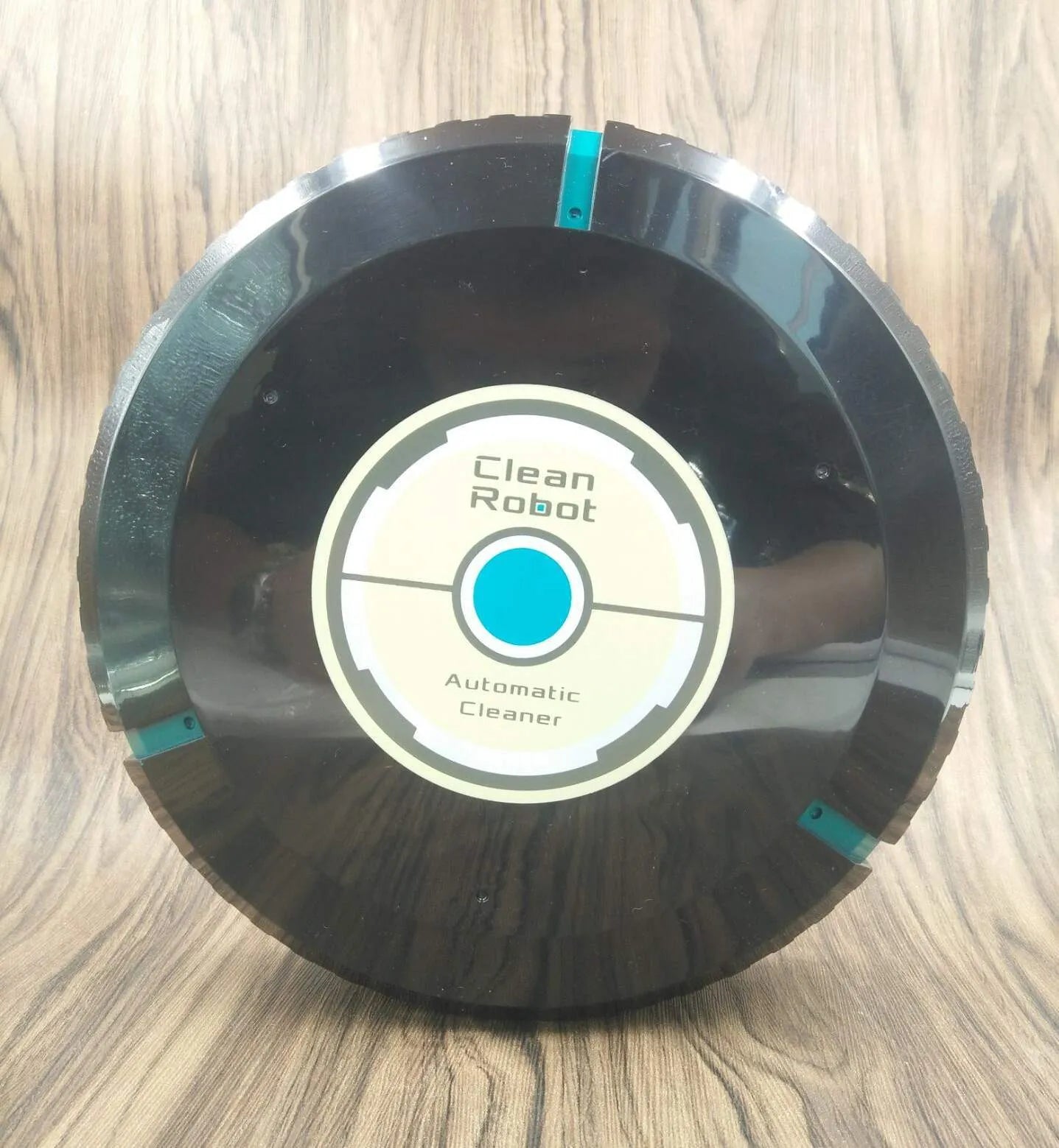 AC automatic sweeping robot vacuum cleaner for carpets and hard floors in black or white colour.