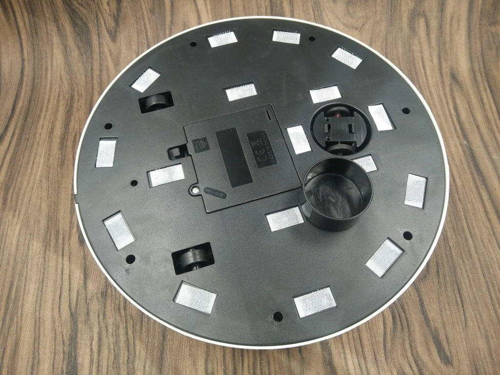 AC automatic sweeping robot vacuum cleaner for carpets and hard floors in black or white colour.