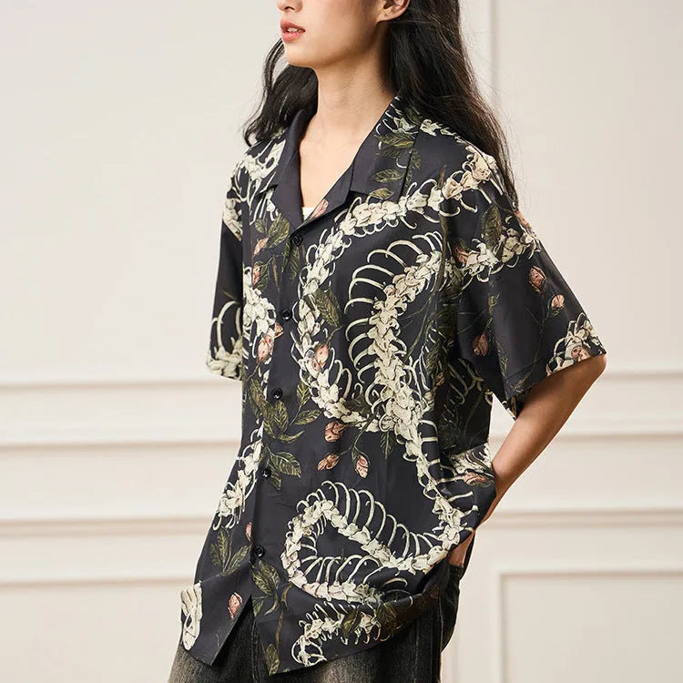 Original snake bone and flower pattern printed on a loose-fit, short sleeve Cuban collar shirt in various colours.