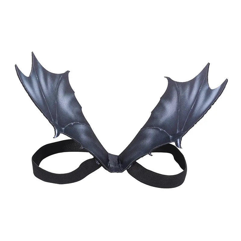Black cloth bat wing costume for a cat or dog on a Halloween background.