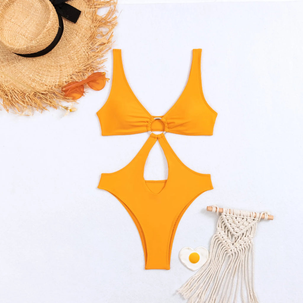Women's black triangle one-piece nylon swimsuit on a mannequin, side view.