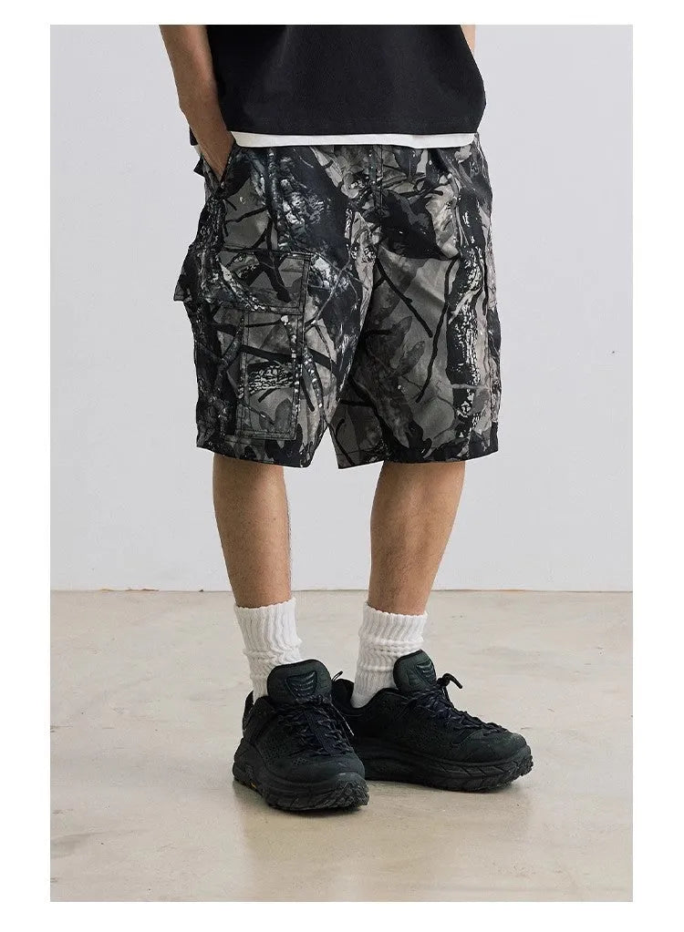 Loose casual straight-leg denim shorts in army green with zip placket closure