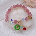 Retro jinsi jade bracelet with fu character blessing card pendant against neutral background