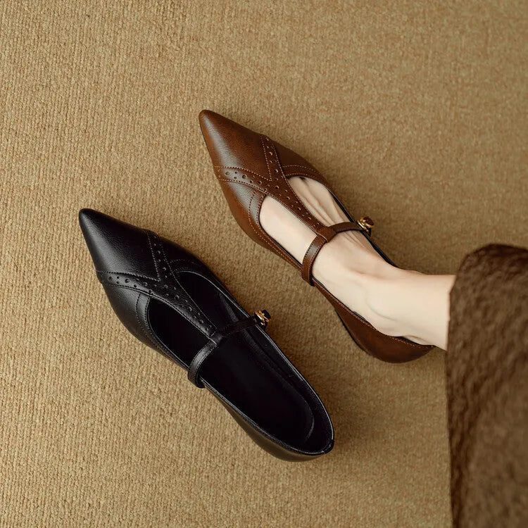 Women's brown pointed toe low-cut flat shoes with a soft sole and cowhide leather uppers.