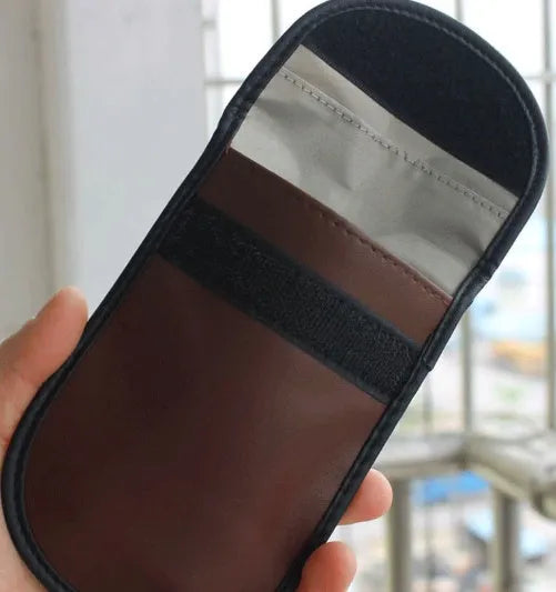 Black microfiber RFID shielding bag for car keys and cards measuring 13.5 by 9.5 cm