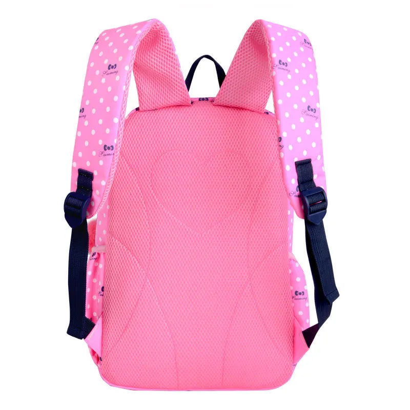 Elementary school girl Korean style cute princess backpack in light pink with polka dot bow pattern, waterproof nylon, reduced burden