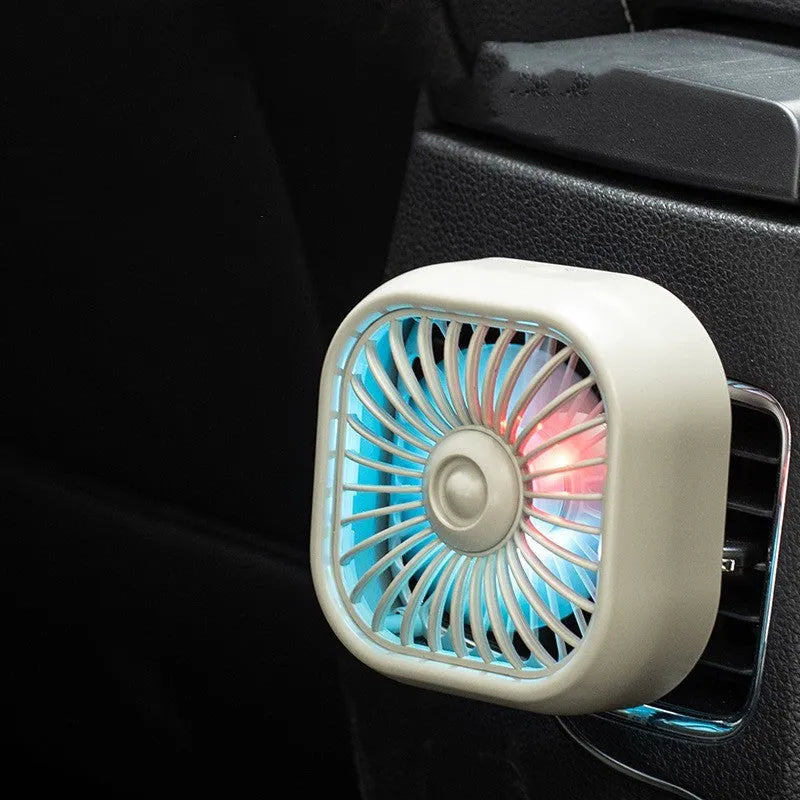 Small black USB car fan with three speed buttons on compact dashboard mount