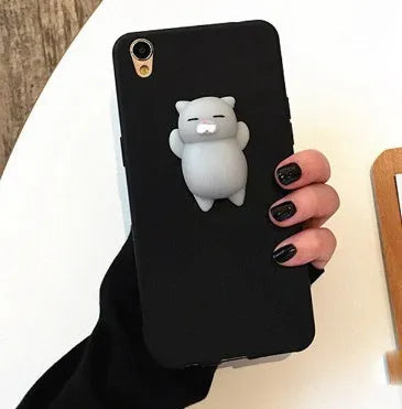 3D cartoon cat design silicone iPhone case in multiple colours showing soft TPU construction