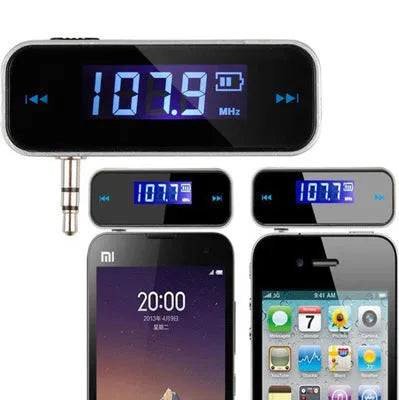 Black car FM transmitter with LCD display showing FM frequency, 3.5mm aux plug connected to smartphone