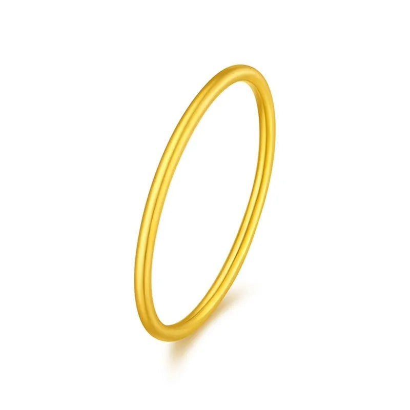 Brass gold plated women's ring showing twist, matte and glossy simple bracelet styles