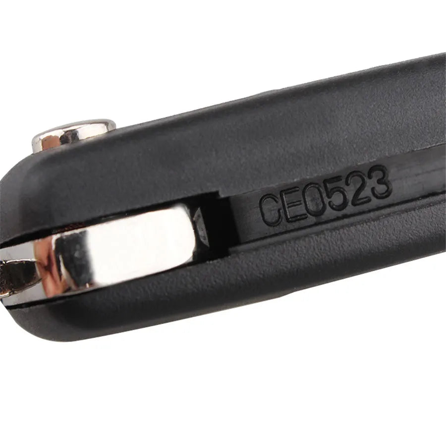 Black Peugeot car key with light on metal key ring