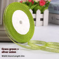 Roll of narrow 0.6cm wide polyester gift wrapping ribbon in an assorted colour, showing 22 metre length.
