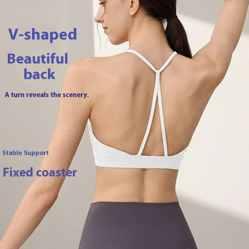 Women's high-strength nylon sports vest for running and yoga in black colour with double-shoulder straps.